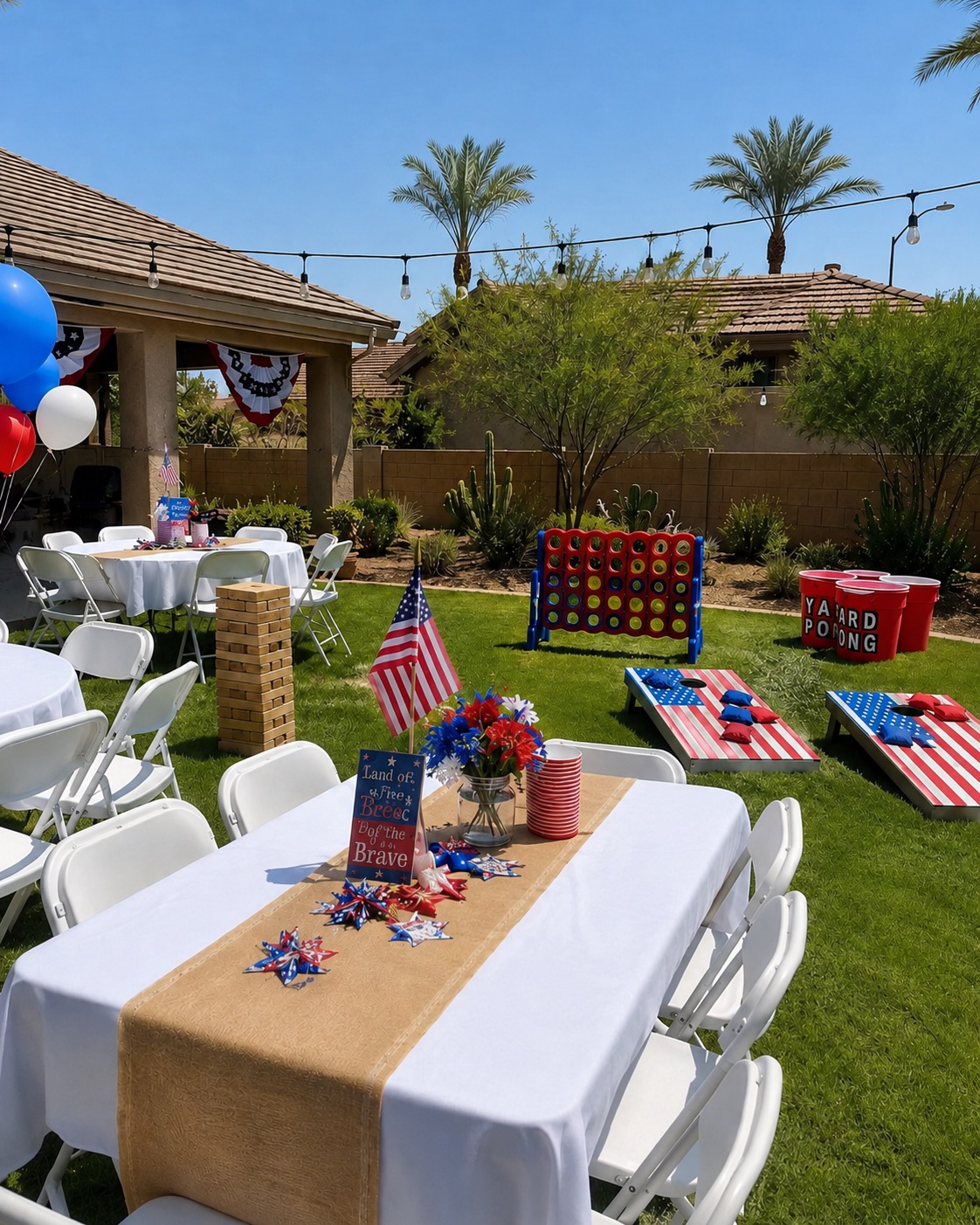 Giant Yard Pong set up with other rentals for a Fourth of July backyard party